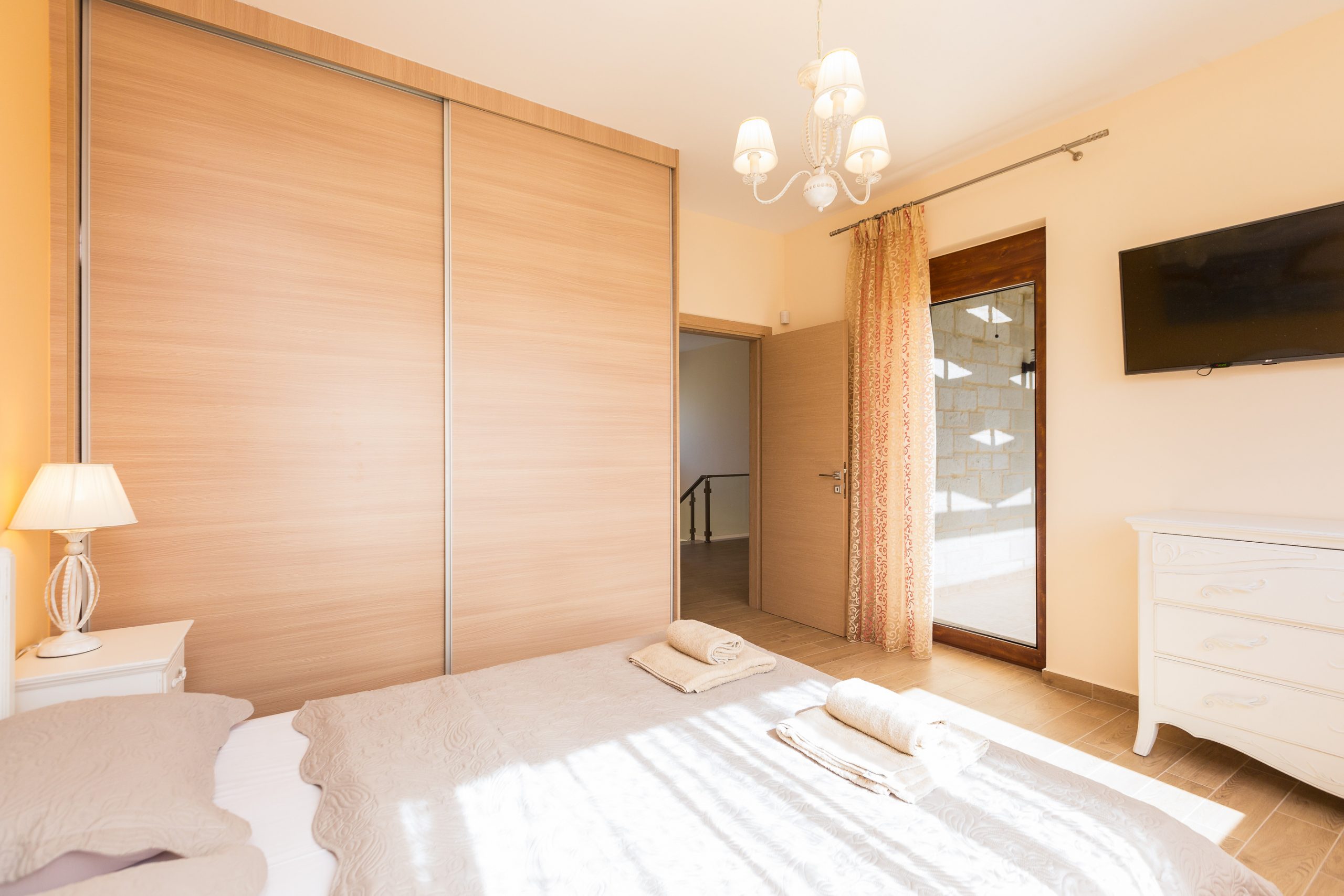 modern greek homes- bedroom interior- Kyriakidis Construction Company